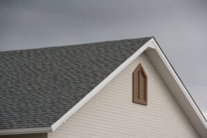 roof shingle of house with dark cloud and sky in rainy season. roof shingle of house in Aledo Texas